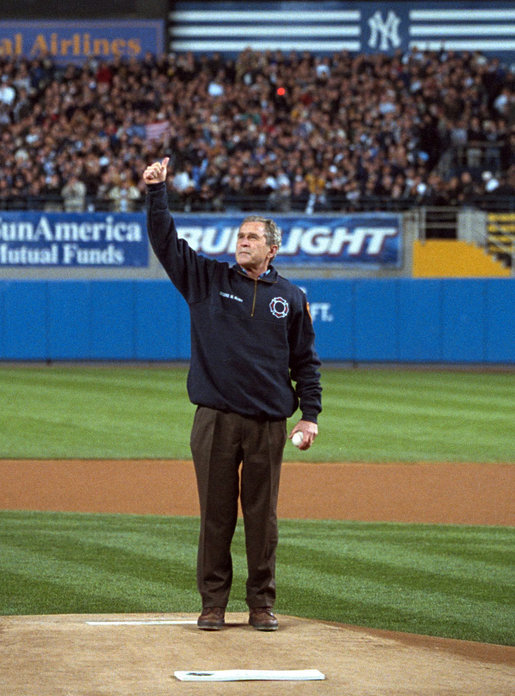 _2012openingdayGeorge_W__Bush_about_to_throw_out_1st_pitch_at_Game_3_of_2001_World_Series